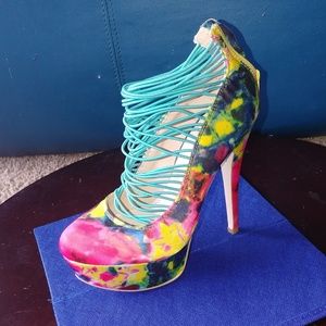 Multi color strapped heel
